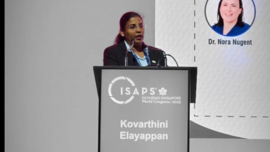 Dr. Kovarthini delivering insights on labiaplasty techniques and patient care at the ISAPS Plastic Surgeons Conference